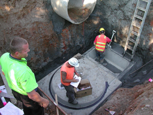 Council Officers install a Gross Pollutant Trap at Cape Woolamai.