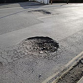 Potholes and dangerously uneven surfaces littering our country road network