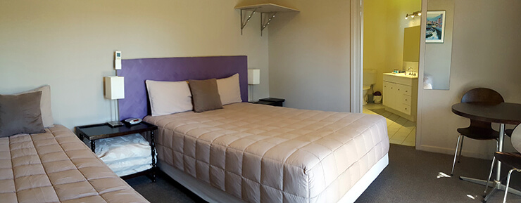 View of room 9 of the Meeniyan Motel showing beds and ensuite - accommodation near Wilsons Promontory and the Great Southern Rail Trail with bike hire